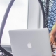 Woman looking at laptop