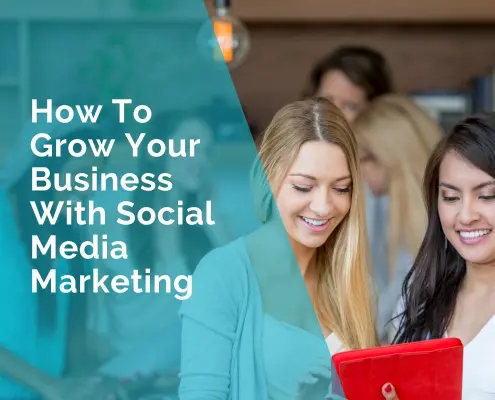 Two young women looking at a mobile phone discussing how to grow their business using social media